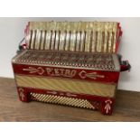 A Vintage German accordion by Pietro in fitted gig bag also with new straps. W:47cm x D:18cm x H: