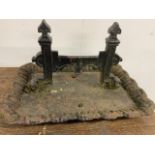 A Victorian wrought iron boot scraper. W:40cm x D:28cm x H:22cm