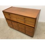 A Nathan sideboard with four drawers and cupboard below W:102cm x D:45cm x H:78cm