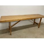 A long trestle table.