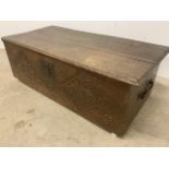 Small oak coffer with carving to front panel. W:85cm x D:40cm x H:28cm