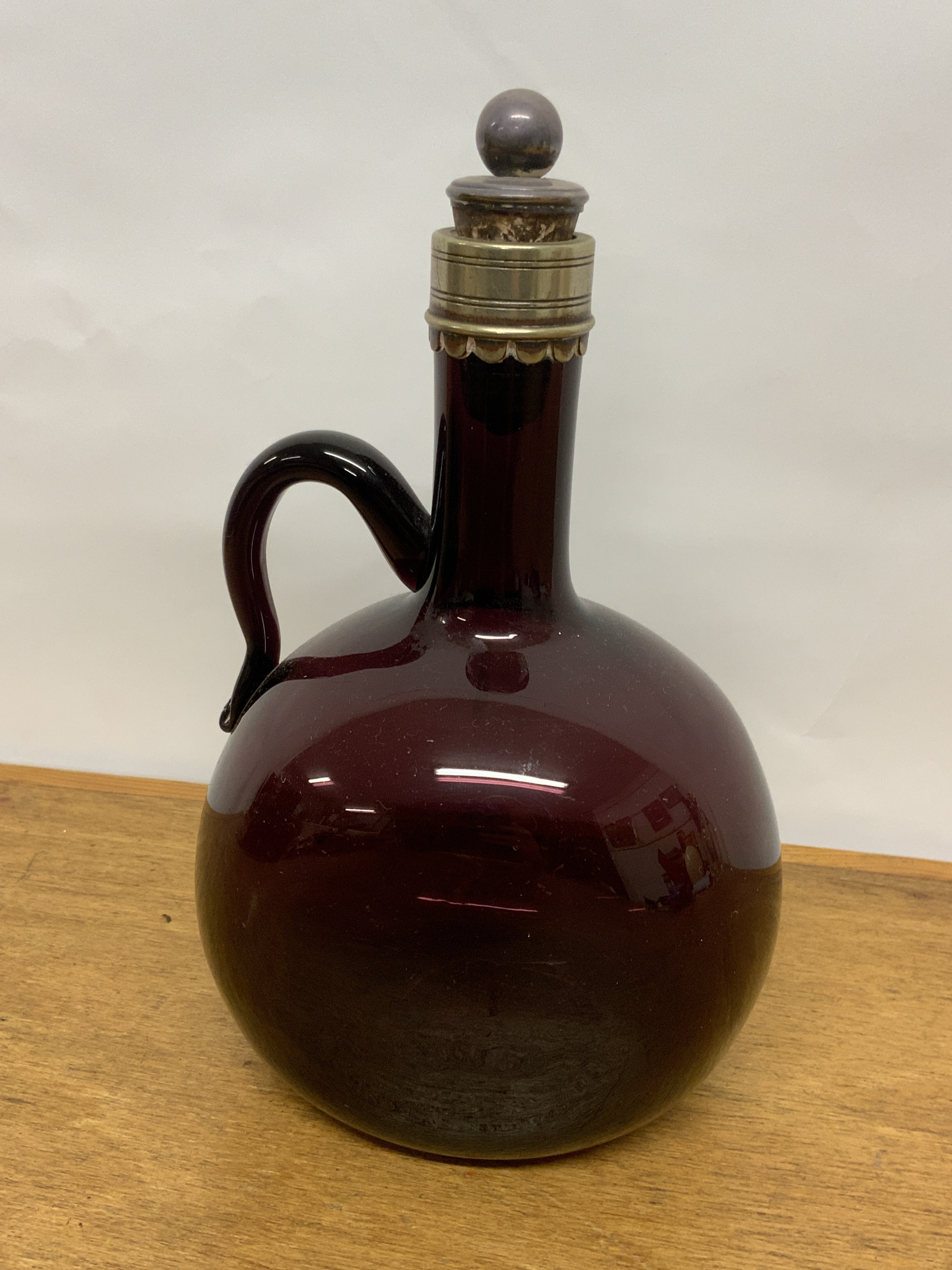 A cranberry decanter.