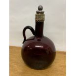 A cranberry decanter.