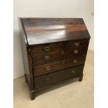 A late 18th-early 19th century mahogany oak bureau with original handles and fitted interior. W: