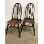 Two Victorian oak stick back country chairs