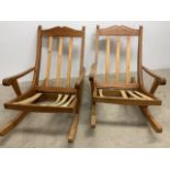 A pair of pine rocking chairs W:66cm x D:115cm x H:79cm