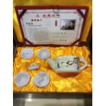 A hand painted oriental tea set n presentation case with COA.