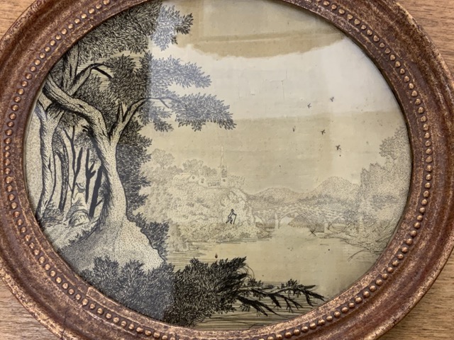 A needlework landscape depicting a river landscape with church and figures in oval frame along - Image 2 of 5