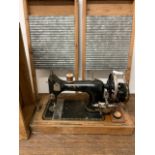 Two washboards and a Royal sewing machine