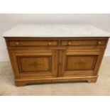 A continental painted pine washstand with marble top, with 2 drawers and cupboard below. W:122cm x