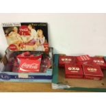 A collection of Coco-Cola glasses and tin sign together with six tin OXO Cube boxes.