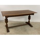 Small oak dining table with detail on sides