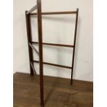 A mahogany folding towel rail W:62cm x D:cm x H:92cm. W:124cm x D:cm x H:92cm