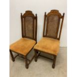 A Pair of high back rattan dining chairs. W.50 D.53 H.110cm