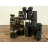 Three pair of binoculars