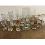 A collection of glasses including hunting and etched glass
