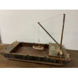 Model of a boat makers vessel, used for transportation of small vessels and testing for