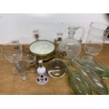 Glassware to include green glass bottles a mirrored centre piece, decanter and drinking vessels.