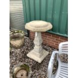 A three section reconstituted stone plinth on stand. Total 89cm(h)