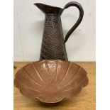 A hand beaten Colcal ware copper dish with brass ball feet also with a copper water jug. W:20cm x