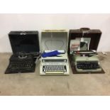 Three typewriters: Imperial Good Companion 5, Hermes 3000 and a Imperial Good Companion Model T.