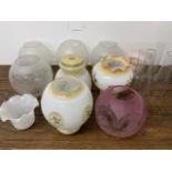 Various victorian shades and chimneys for oil lamps. Including a cranberry shade.