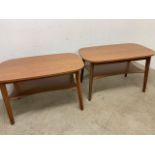 A pair of Formica topped tables with shelf. W:100cm x D:60cm x H:61cm