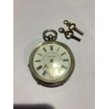 A sterling silver cased key wind pocket watch. The Westminster Non magnetic capped lever by