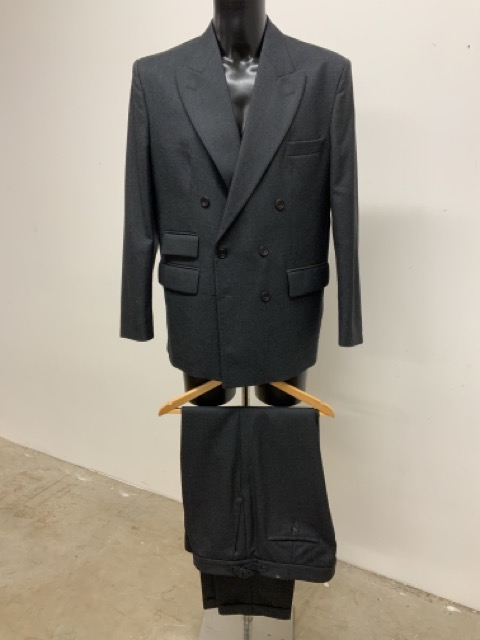 A two piece double breasted wool suit by Pakeman & Catto Carter. 42C 36W