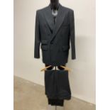 A two piece double breasted wool suit by Pakeman & Catto Carter. 42C 36W
