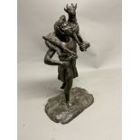 A classical bronze figure on a naturalistic bronze base. W:23cm x D:15cm x H:40cm