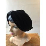 1940s head mannequin (repaired) together with a 1930s panne velvet and grosgrain loose turban