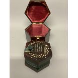 An early 20th century rosewood hexagonal accordion by RJ Ward and Son ,Liverpool. In original velvet