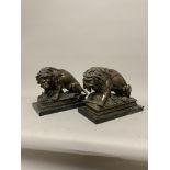 A pair of bronze recumbent lion garnitures on marble plinth bases after Canova W:15cm x D:29cm x