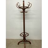 A bentwood mahogany hatstand.W:56cm x D:56cm x H:205cm