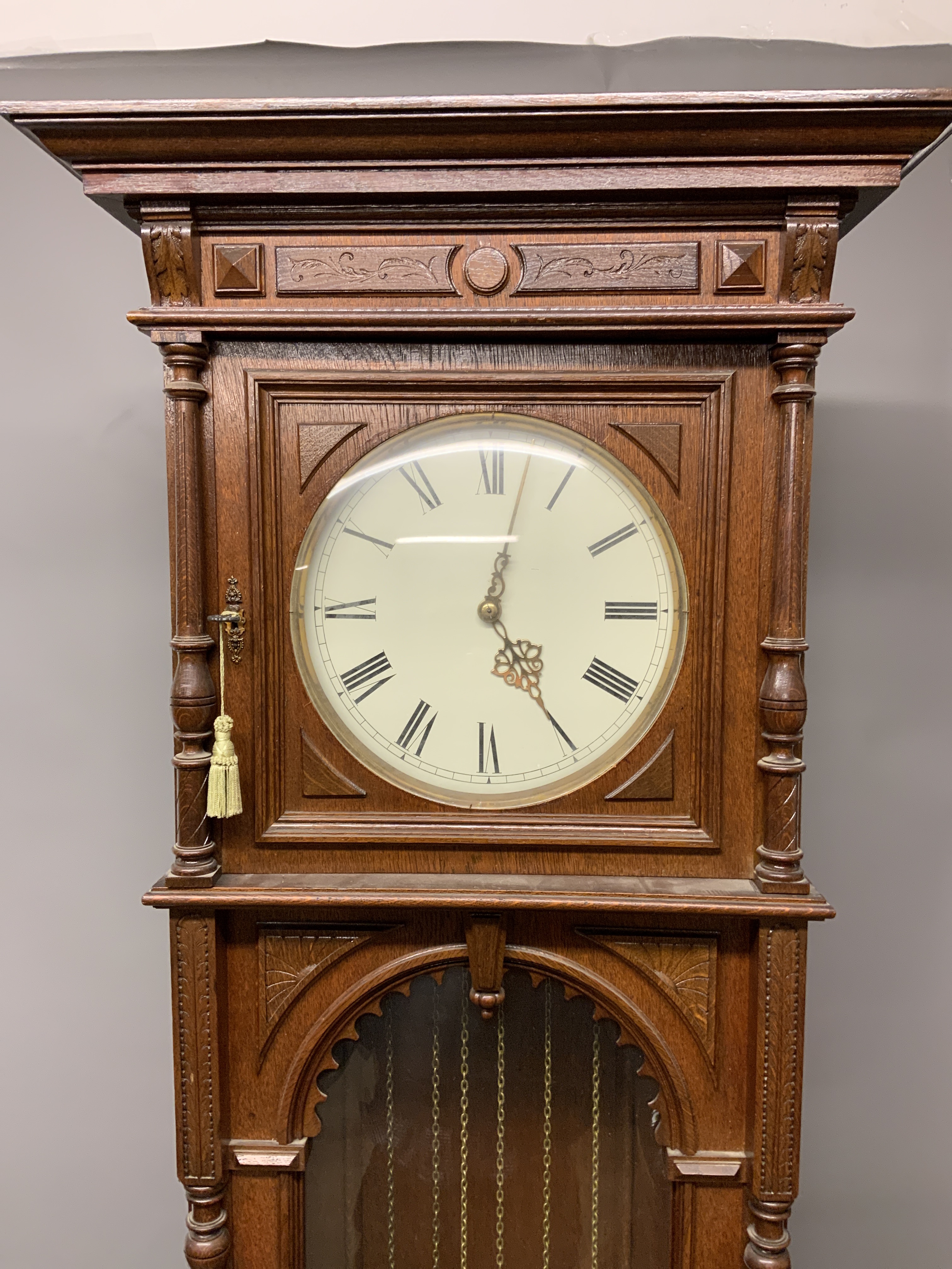 A large 20th century oak longcase clock, the case with arched glazed door. Triple weight chiming - Image 3 of 8