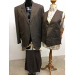 A bespoke three piece, three button vintage suit by Richard James Saville Row. 42M