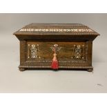A good quality Regency mother of pearl inlaid rosewood tea caddy with fitted interior, ring
