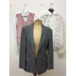 A Gentlemans Harris tweed jacket together with two shirts and a pink waistcoat. Size 40R.
