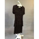 American stylish 1940s beaded crepe cocktail dress with peplum