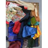 Large selection of silk pocket squares together with pigskin leather and cotton driving gloves