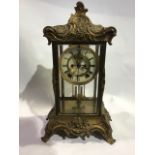 French gilt bronze/ormolu four bevelled glass mantel clock, French movement with visible