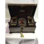 A good quality Regency brass inlaid rosewood tea caddy with fitted interior, ring handles and bun