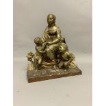 A gilt metal figural group of a seated lady and children.W:34cm x D:14cm x H:36cm