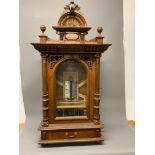 A late 19th early 20th century mahogany cased Polyphon, penny operated, table top, with single