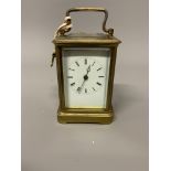 A gilt brass carriage clock. W:9cm x D:8cm x H:12cm