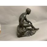 A large spelter model of a nude seated classical gentleman. W:45cm x D:27cm x H:48cm