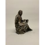 A bronze seated figure of Jean de la Fontaine after Ernest Rancoulet (French, 1870-1915). Signed.