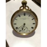 A gold plated crown wind open faced pocket watch by Lancashire Watch Co Ltd Prescot. White enamel