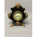 An Ansonia USA slate and ormolu mantle clock. W:25cm x D:13cm x H:29cm